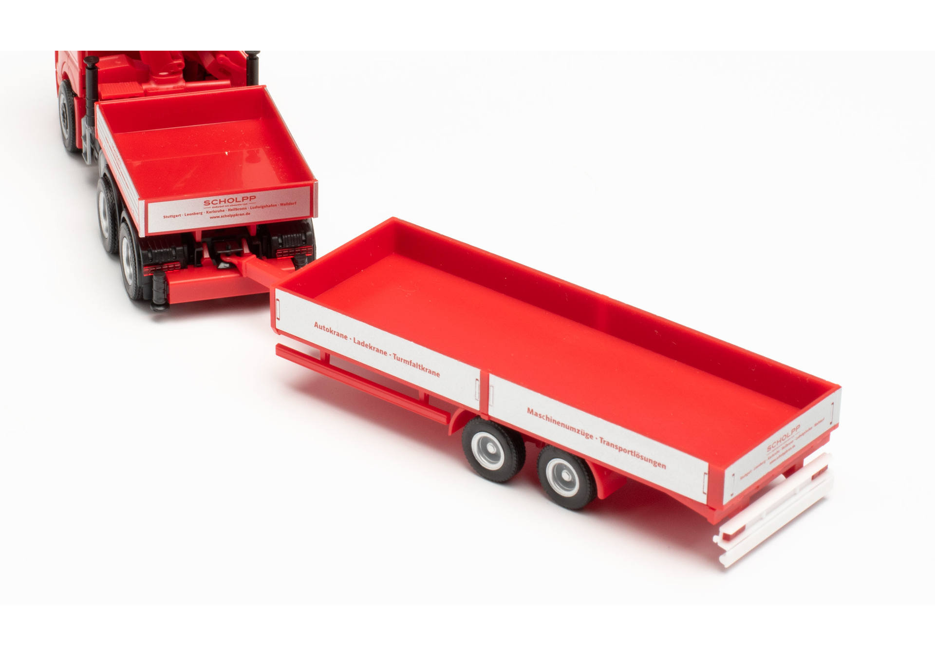 Mercedes-Benz Arocs tractor with loading crane, ballast flatbed, and low-body trailer Scholpp.