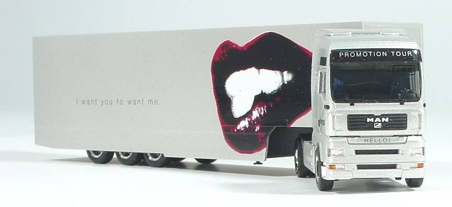 MAN L41 box semitrailer "Give me your face"