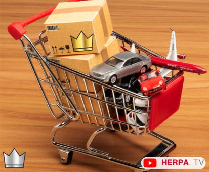 Miniature shopping cart with small cars, boxes and plane in it. Herpa Club crown icons in left corner and on boxes and Herpa TV logo with youtube play button in right corner.