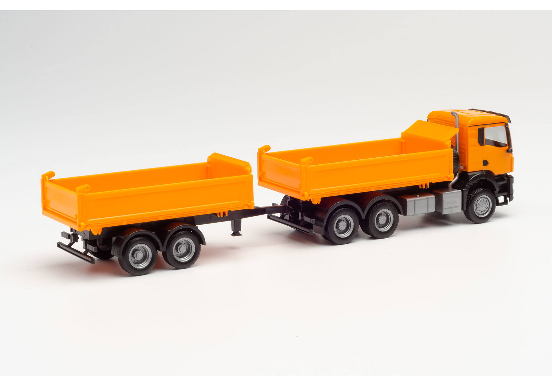 MAN TGX NN tandem construction tipper trailer truck, municipal orange