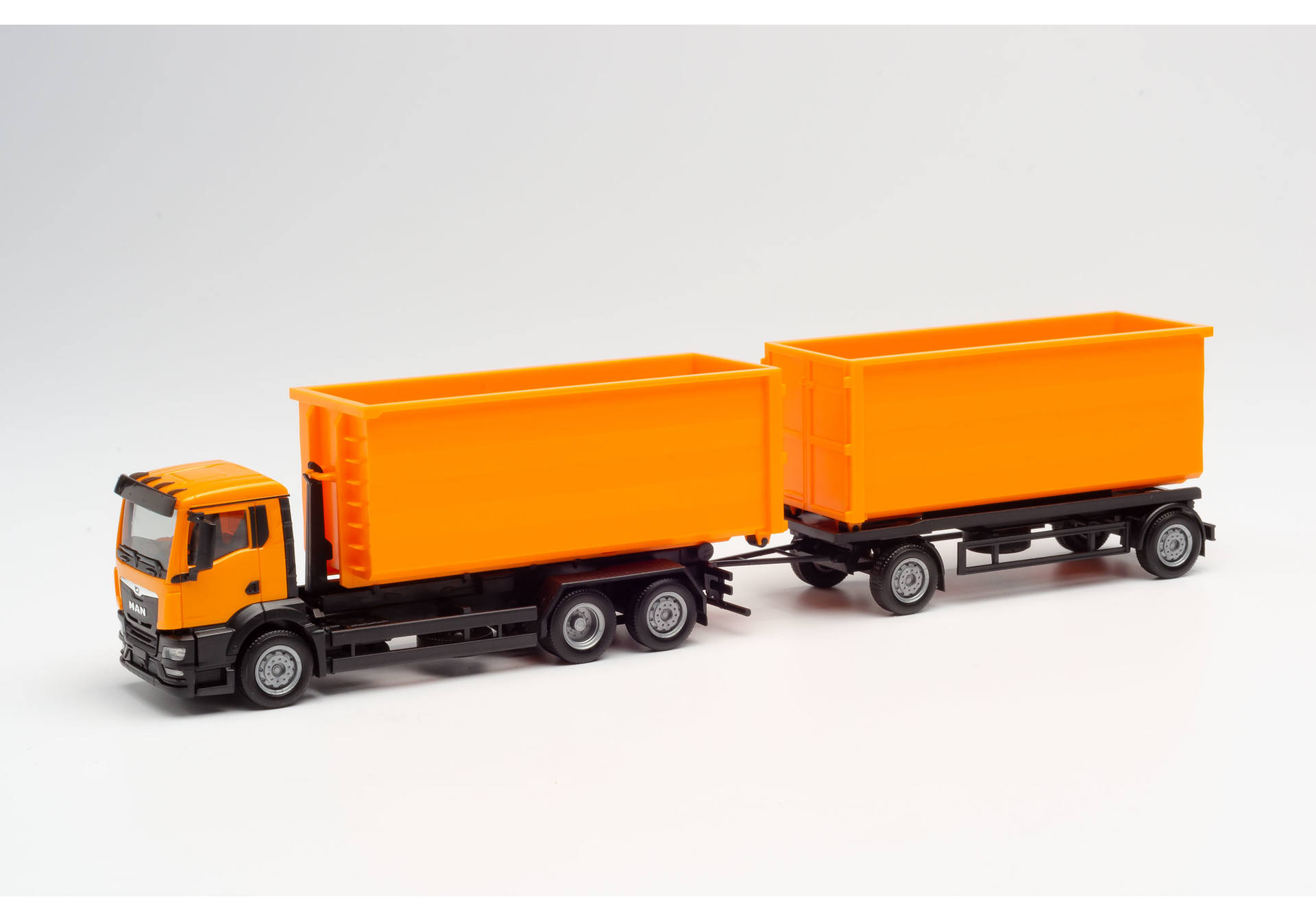 roll-off containert ruck with trailer, communal orange H0 1/87 H0 1/87 H0 1/87 312448 39,95 € Scania CR 20 HD Kühlkoffer-Hängerzug / Scania CR 20 HD refrigerated box truck with trailer „Müll