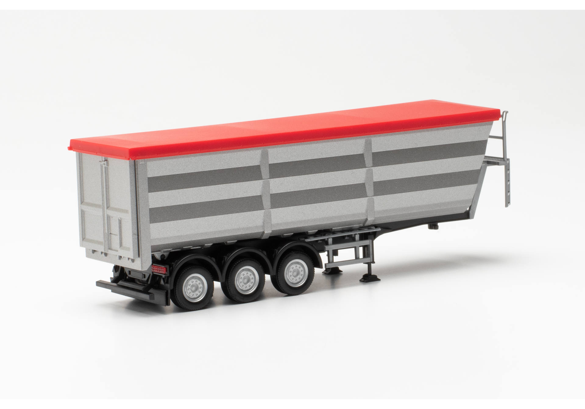 Steel dump trailer, silver with red tarp