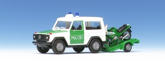 Mercedes-Benz 300 GE with trailer and motorcycle