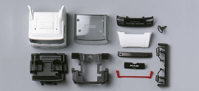 MAN F2000 Evo driver's cabin with side skirting (incl. rear-view mirror)Content: 2 pcs.