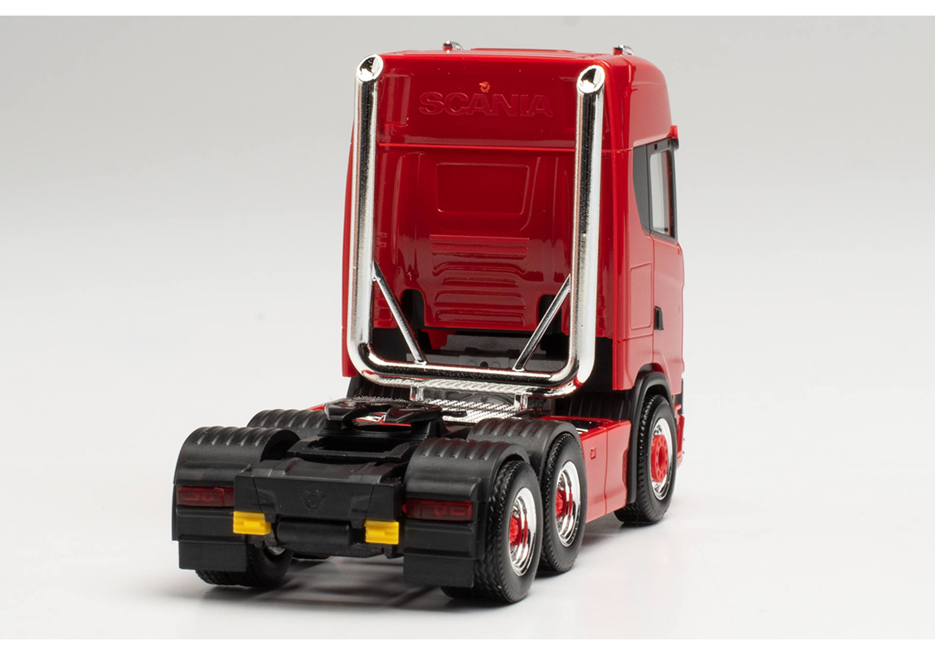 Scania CS 20 high roof 6×2 tractor with pipes, lamp bracket, fanfare, and impact protection, red