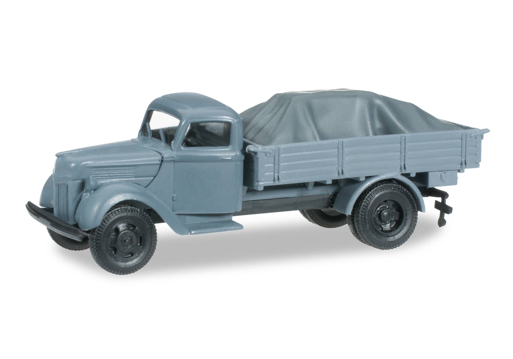 Ford V 3000 pick-up truck with load under the canvas