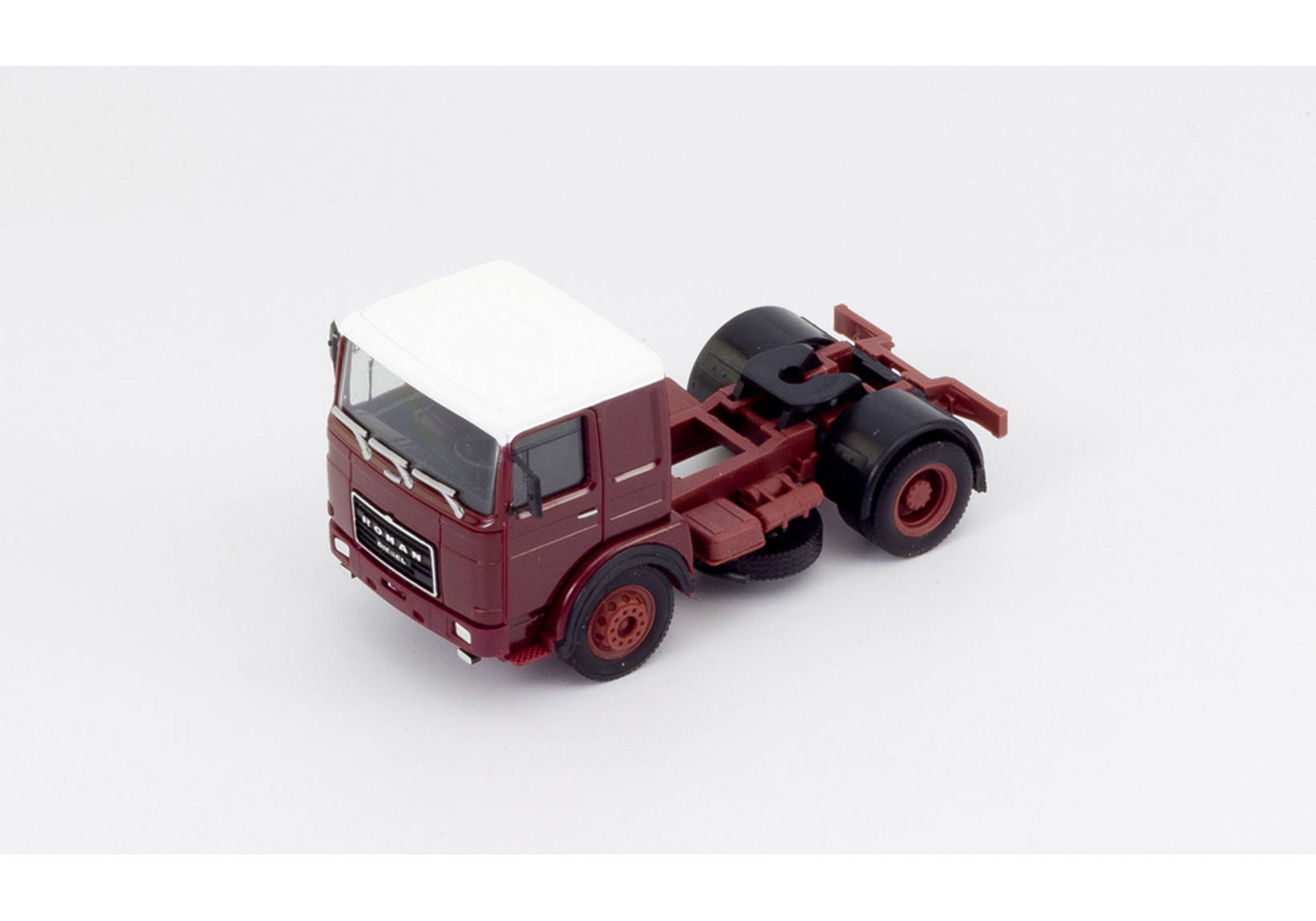 Roman Diesel 4×2 rigid tractor, brown-red / white roof