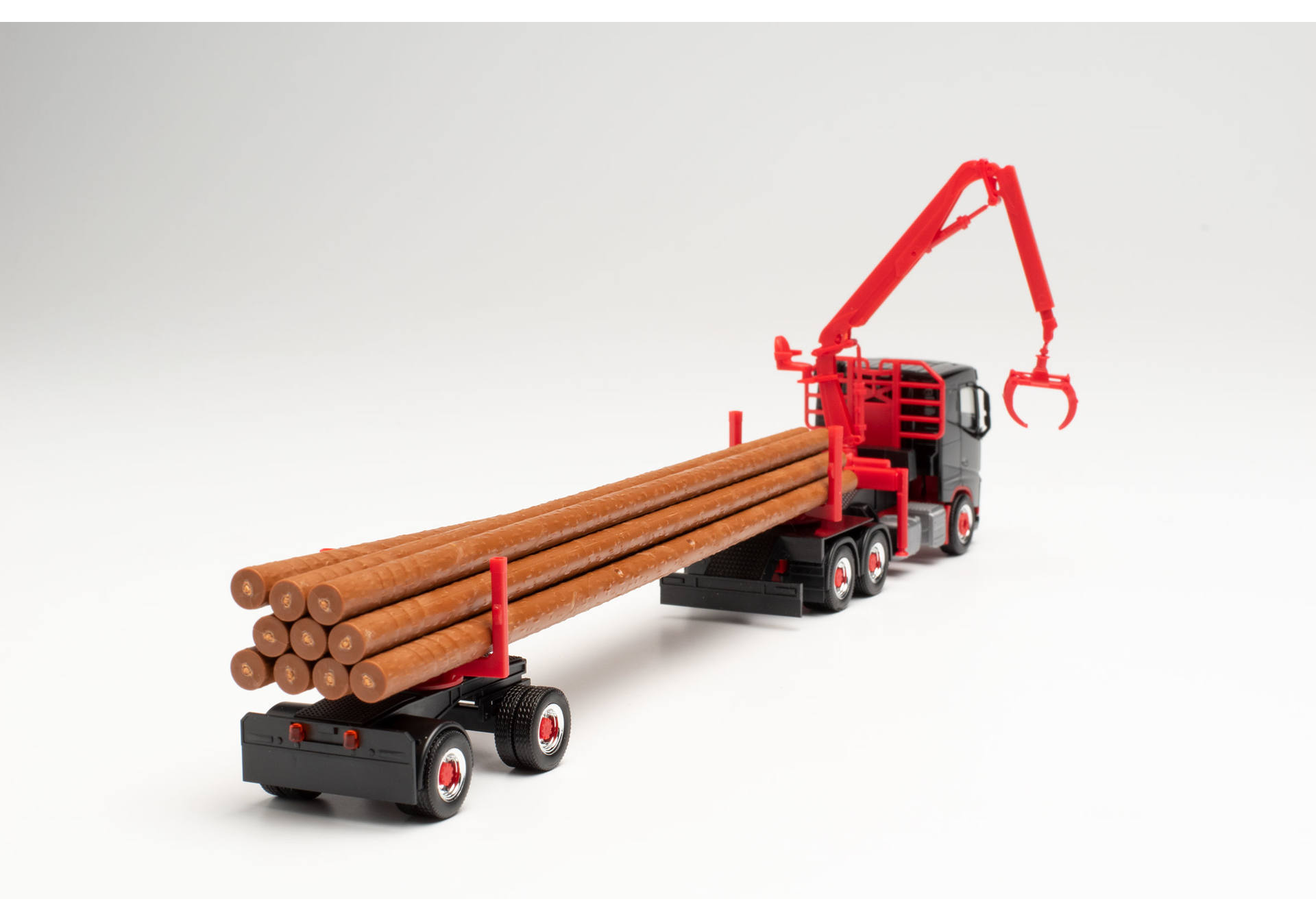Volvo FH FD Langholztransporter-Sattelzug, schwarz/rot