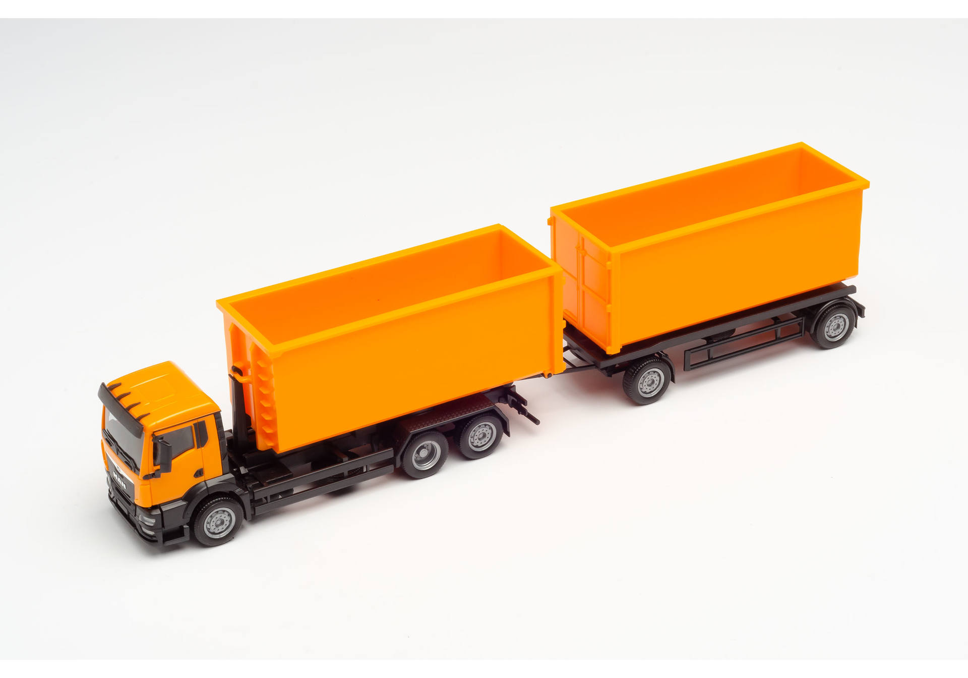 roll-off containert ruck with trailer, communal orange H0 1/87 H0 1/87 H0 1/87 312448 39,95 € Scania CR 20 HD Kühlkoffer-Hängerzug / Scania CR 20 HD refrigerated box truck with trailer „Müll