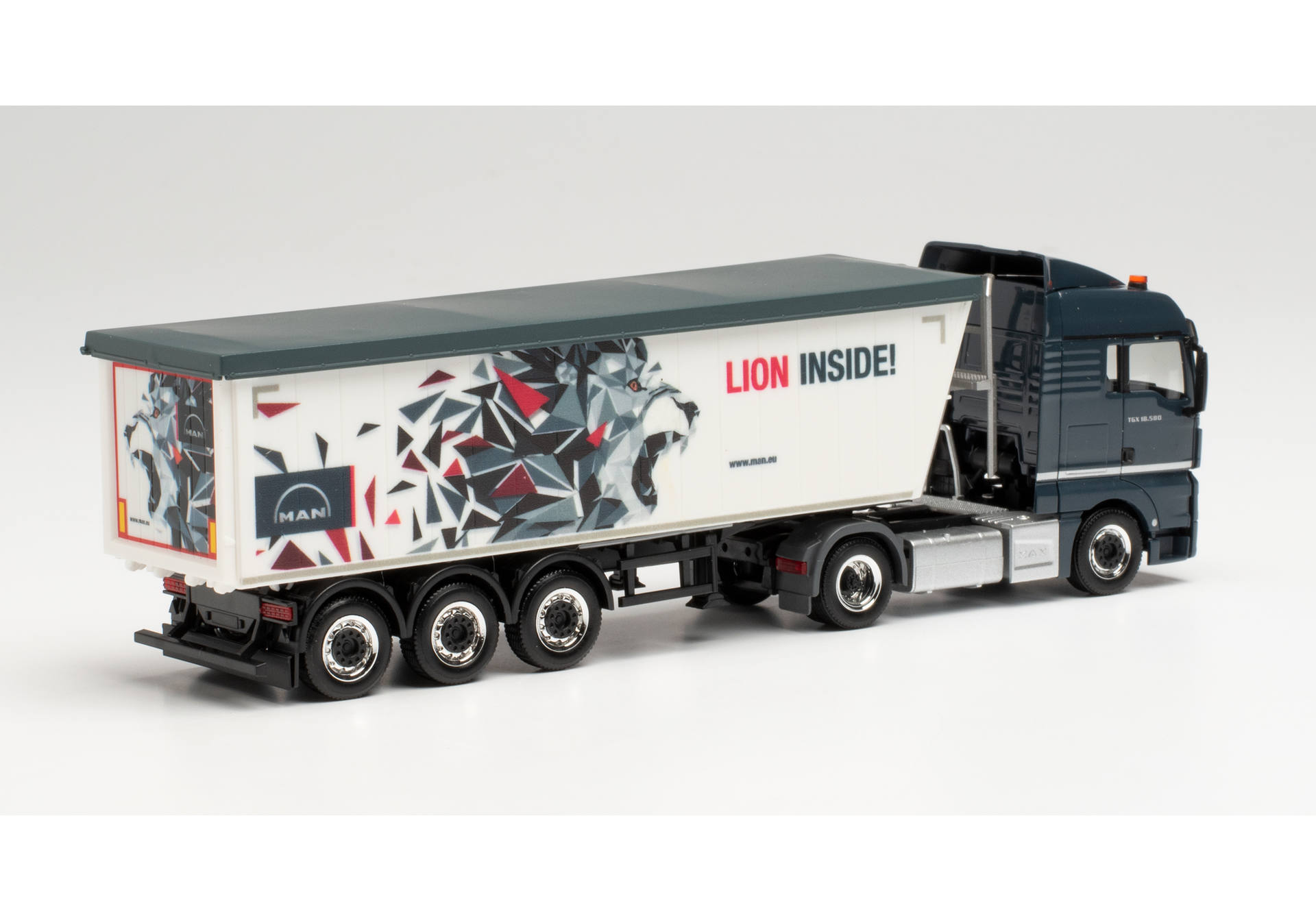 MAN TGX XLX Stöffelliner semitrailer "Lion Inside"