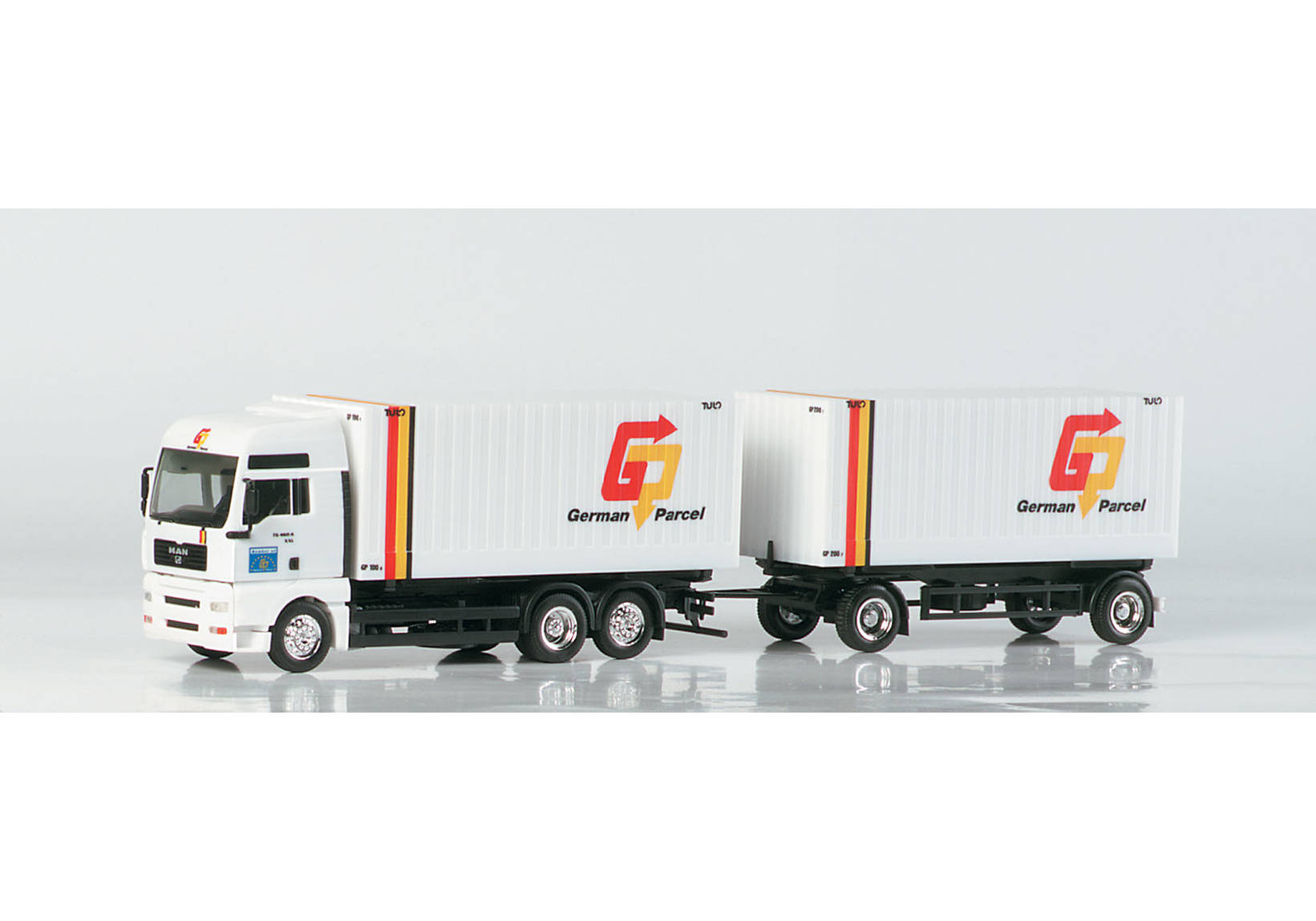 MAN TGA XXL interchangeable cargo box trailer "German Parcel"