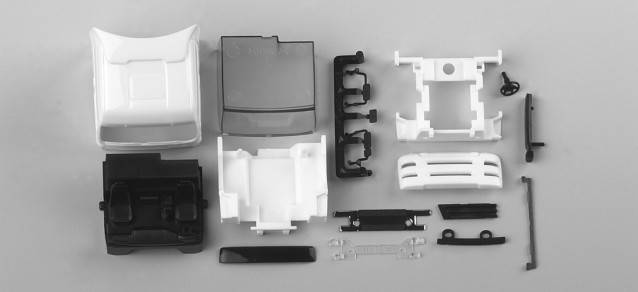 Steyr ST-A XXL driver's cabin with side skirting and sun shield (incl. rear-view mirror)Content: 2 pcs.