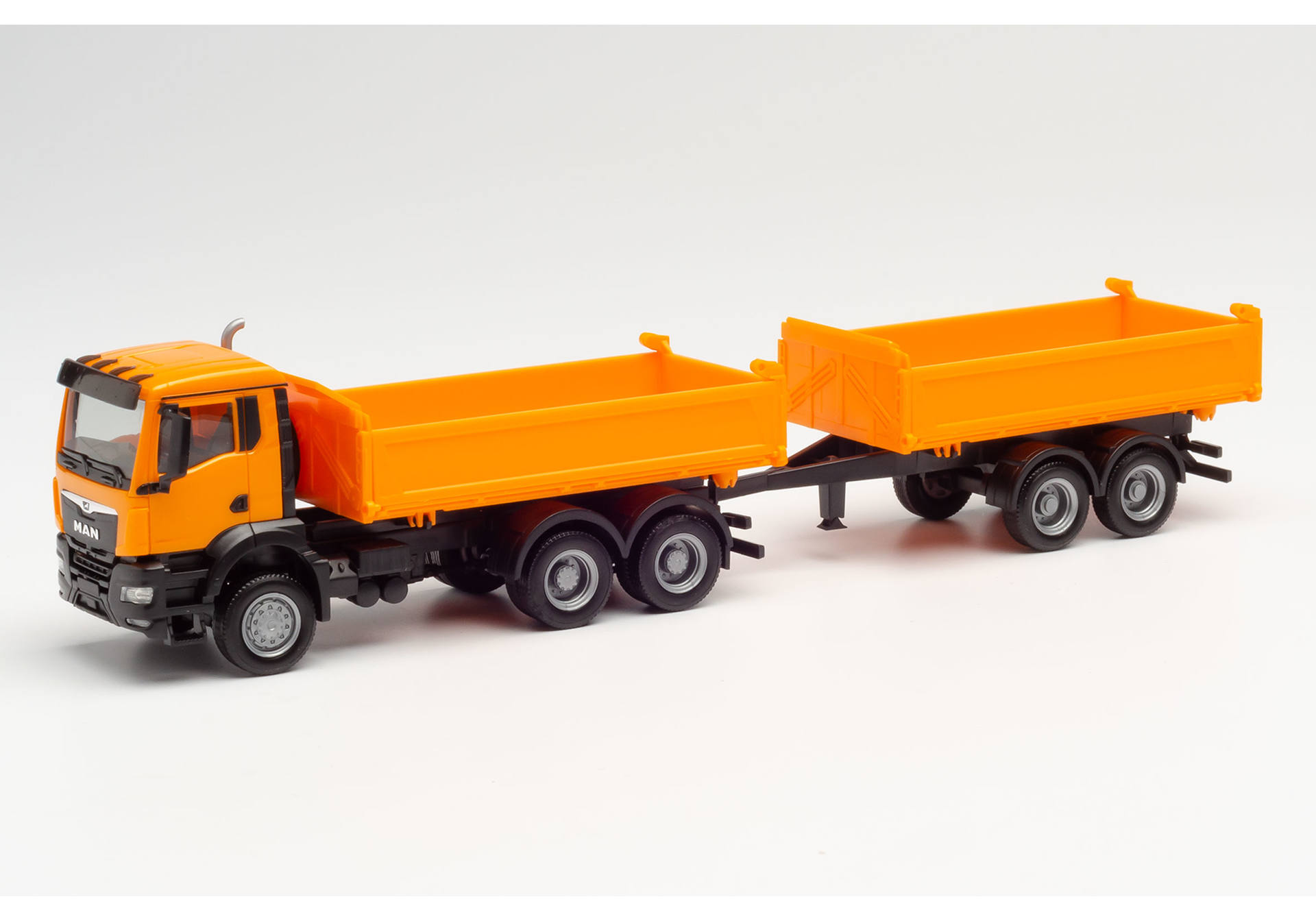 MAN TGX NN tandem construction tipper trailer truck, municipal orange