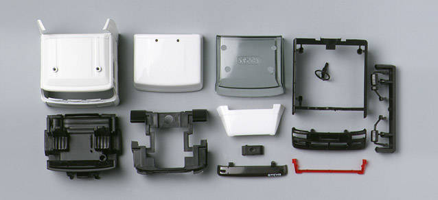 Steyr NSK driver's cabin with raised roof and side skirting (incl. rear-view mirror)Content: 2 pcs.