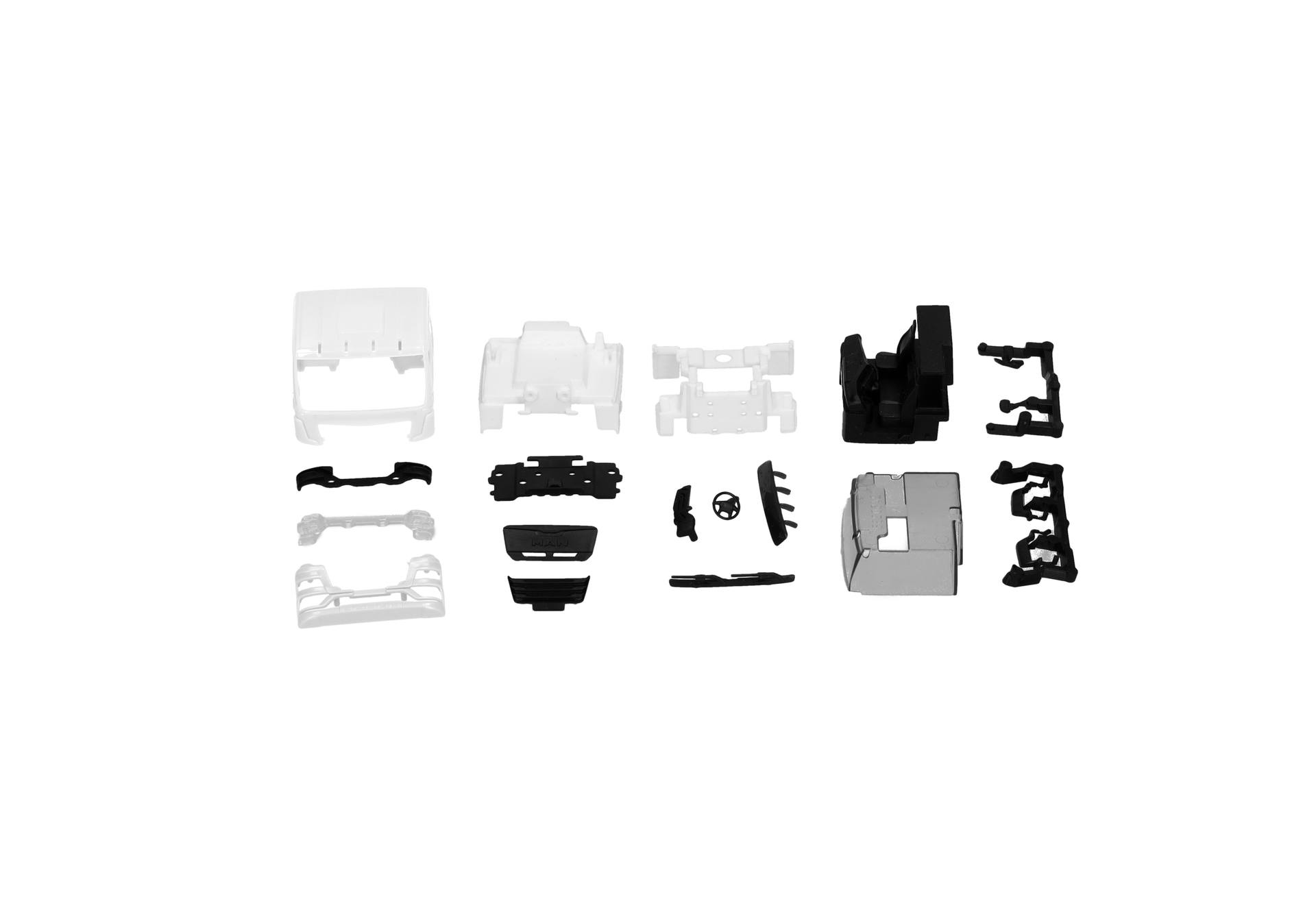 model parts, assembly kit, white and black pieces, plastic components, modular fasteners