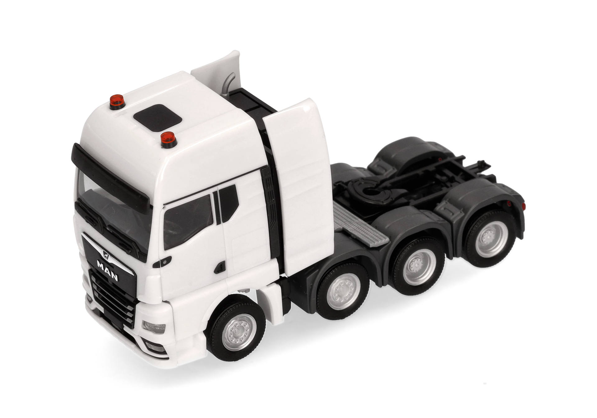 MAN TGX GX heavy duty tractor 4-axles (air-suspended, 8x4), white