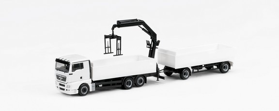 Man TGX XL building material hanger train with a loading crane and pallet gripper