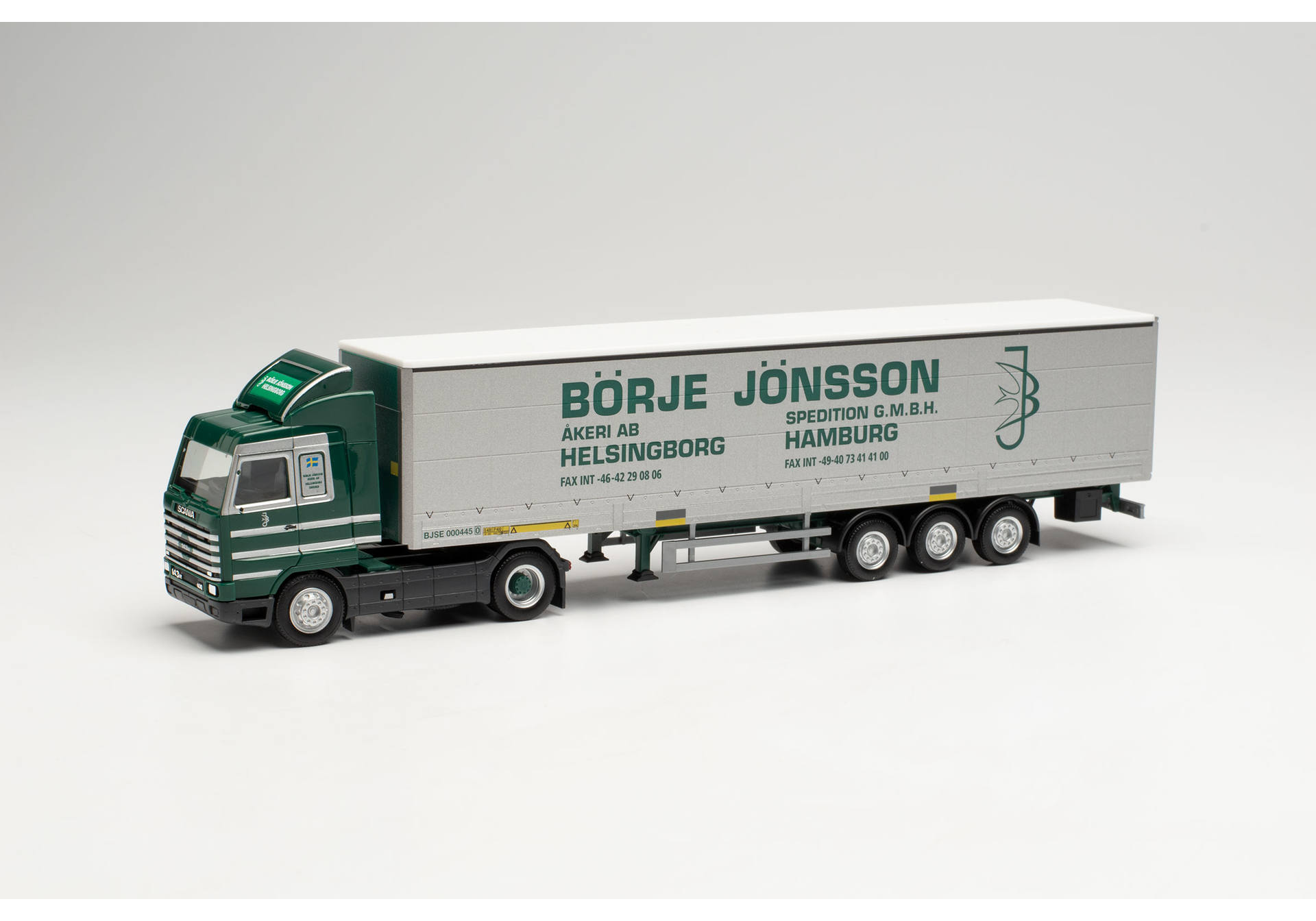 Scania 143 SL Gardinenplanen-Sattelzug mit Bordwänden „Börje Jönsson“