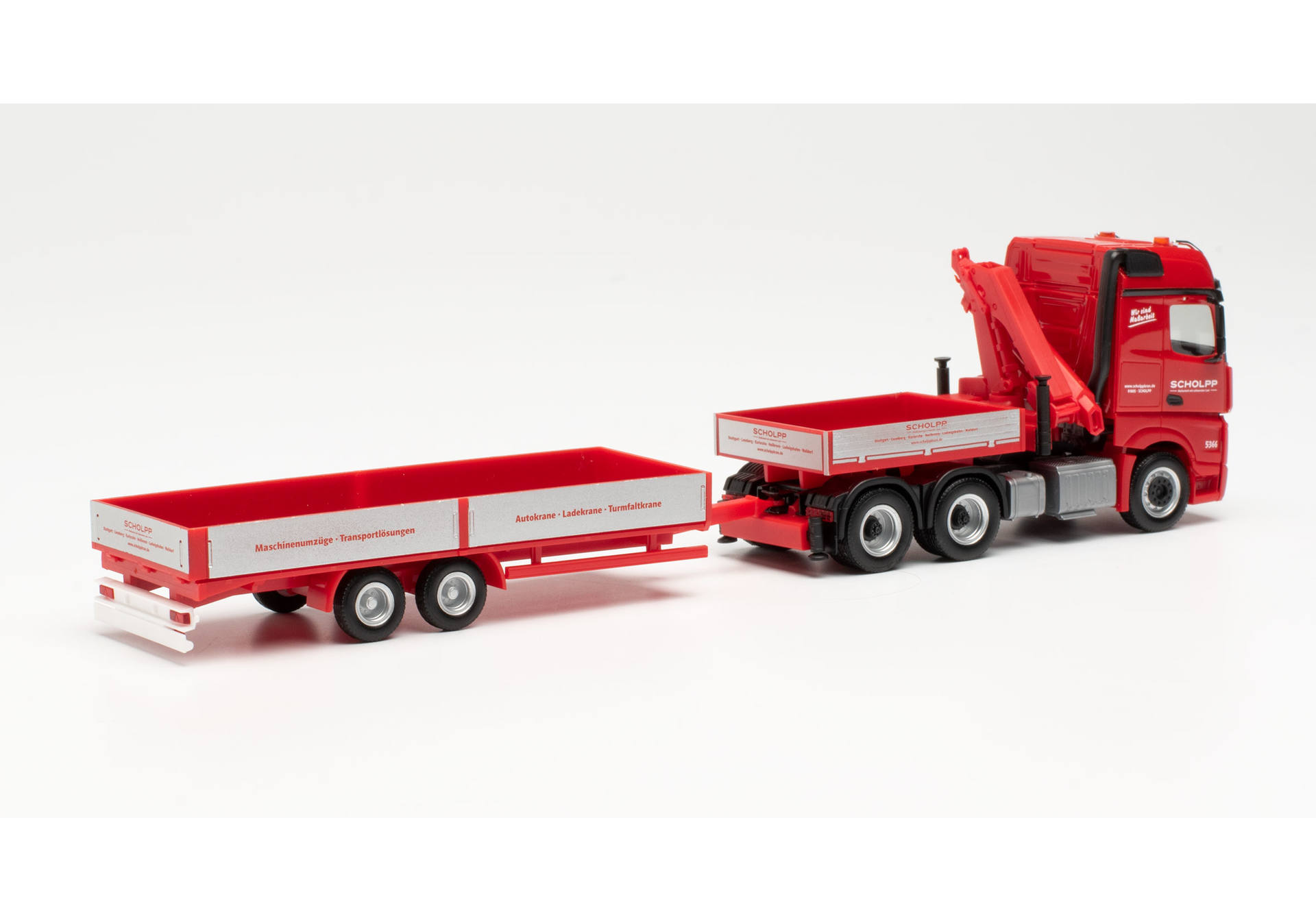 Mercedes-Benz Arocs tractor with loading crane, ballast flatbed, and low-body trailer Scholpp.