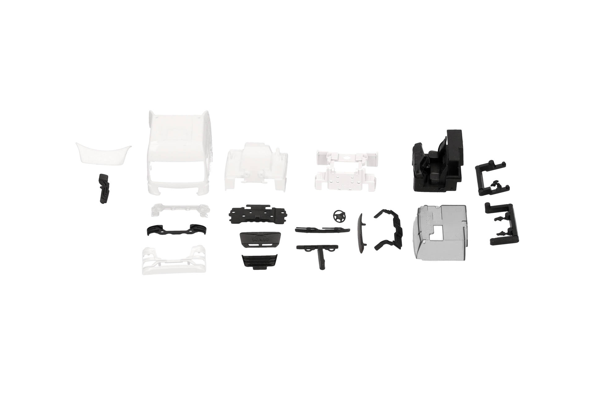model kit, assembly parts, white and black pieces, plastic components, miniature figures