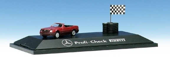 Mercedes-Benz 500 SL with tire and flag