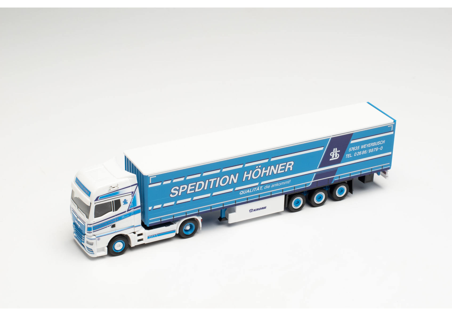 MAN TGX GX Gardinenplanen-Sattelzug „Höhner“