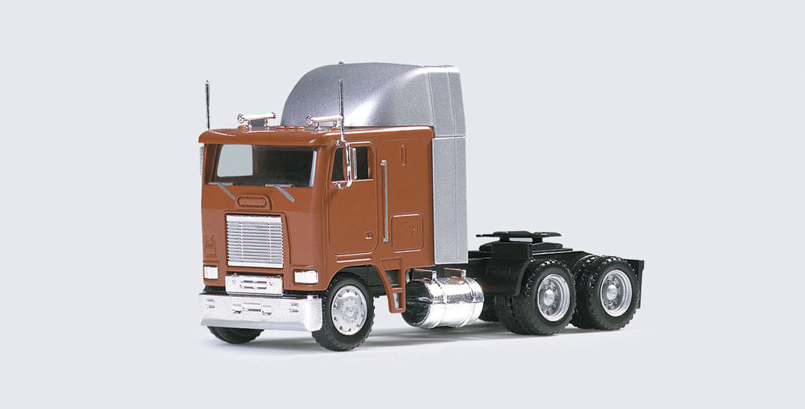 Kenworth COE rigid tractor with air dam and spoiler