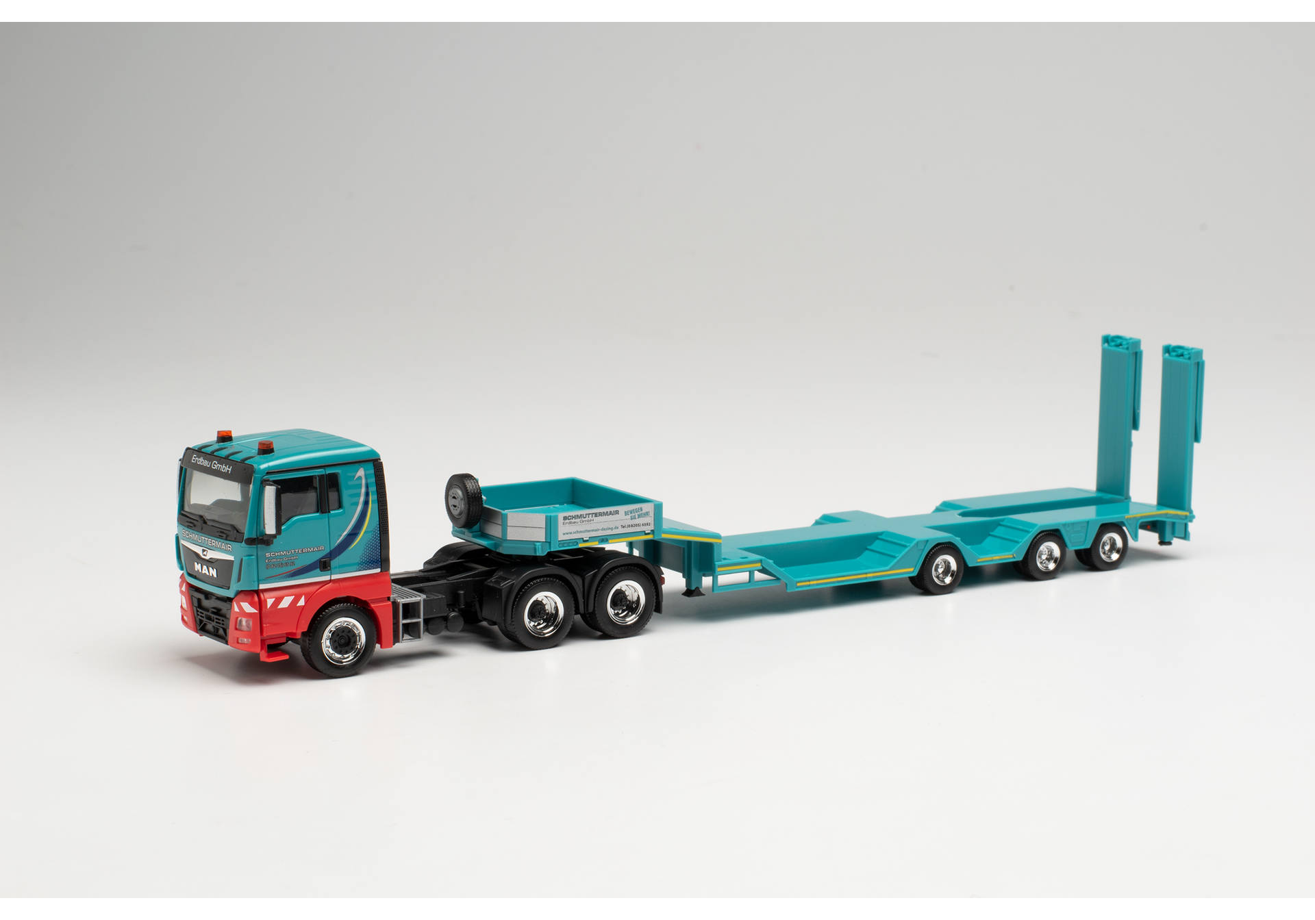 MAN TGX L 6x4 lowboy semitrailer „Schmuttermair“