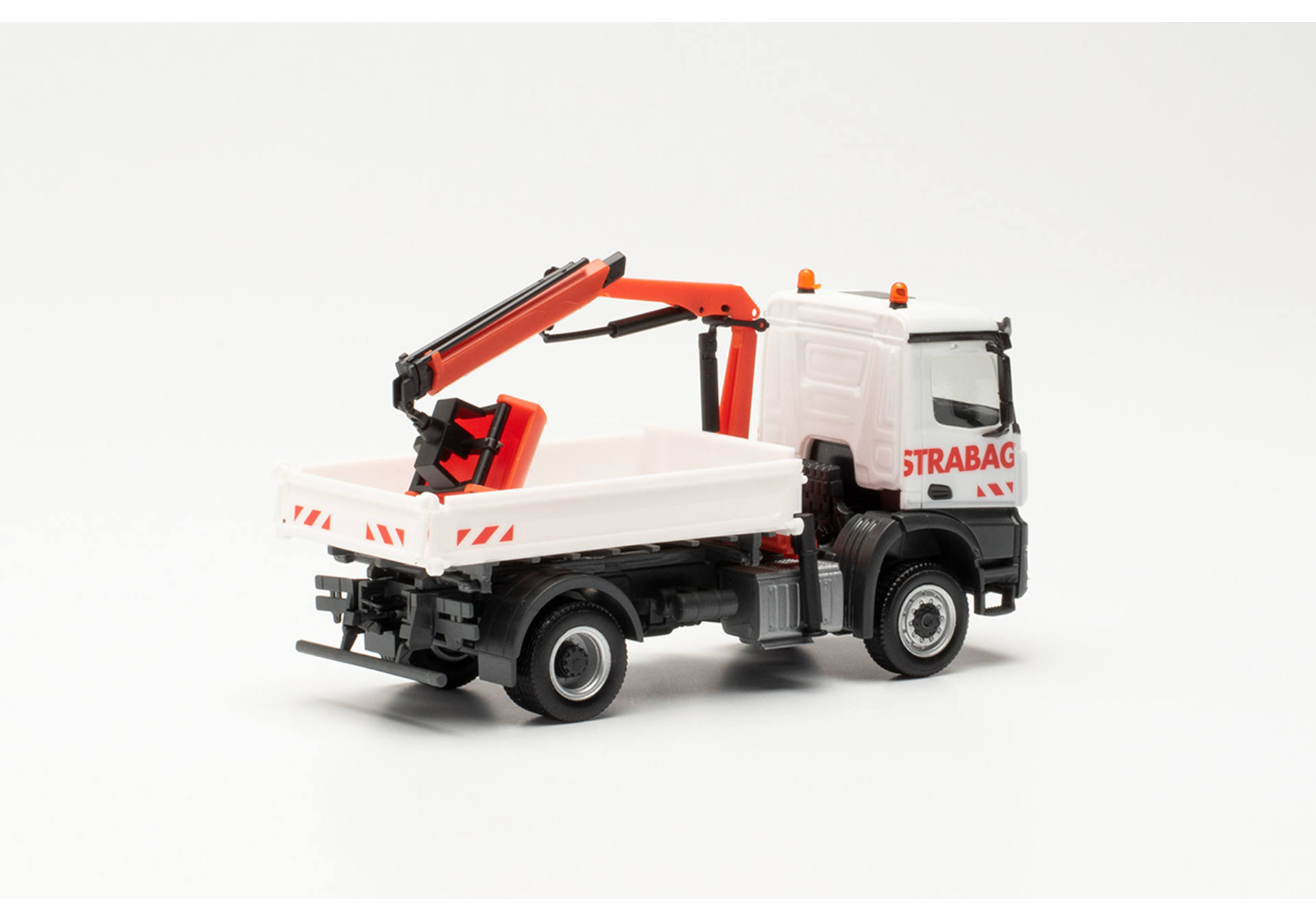 Mercedes-Benz Arocs S three-way tipper with crane STRABAG