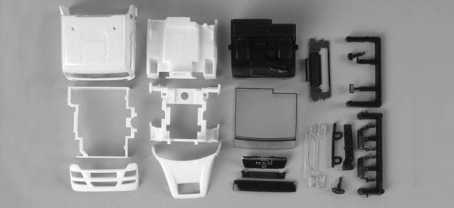 MAN TGX XLX driver's cabin with side skirting and roof spoiler (incl. rear-view mirror)Content: 2 pcs.