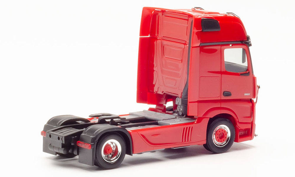 rigid tractor with impact protection and lamp bracket