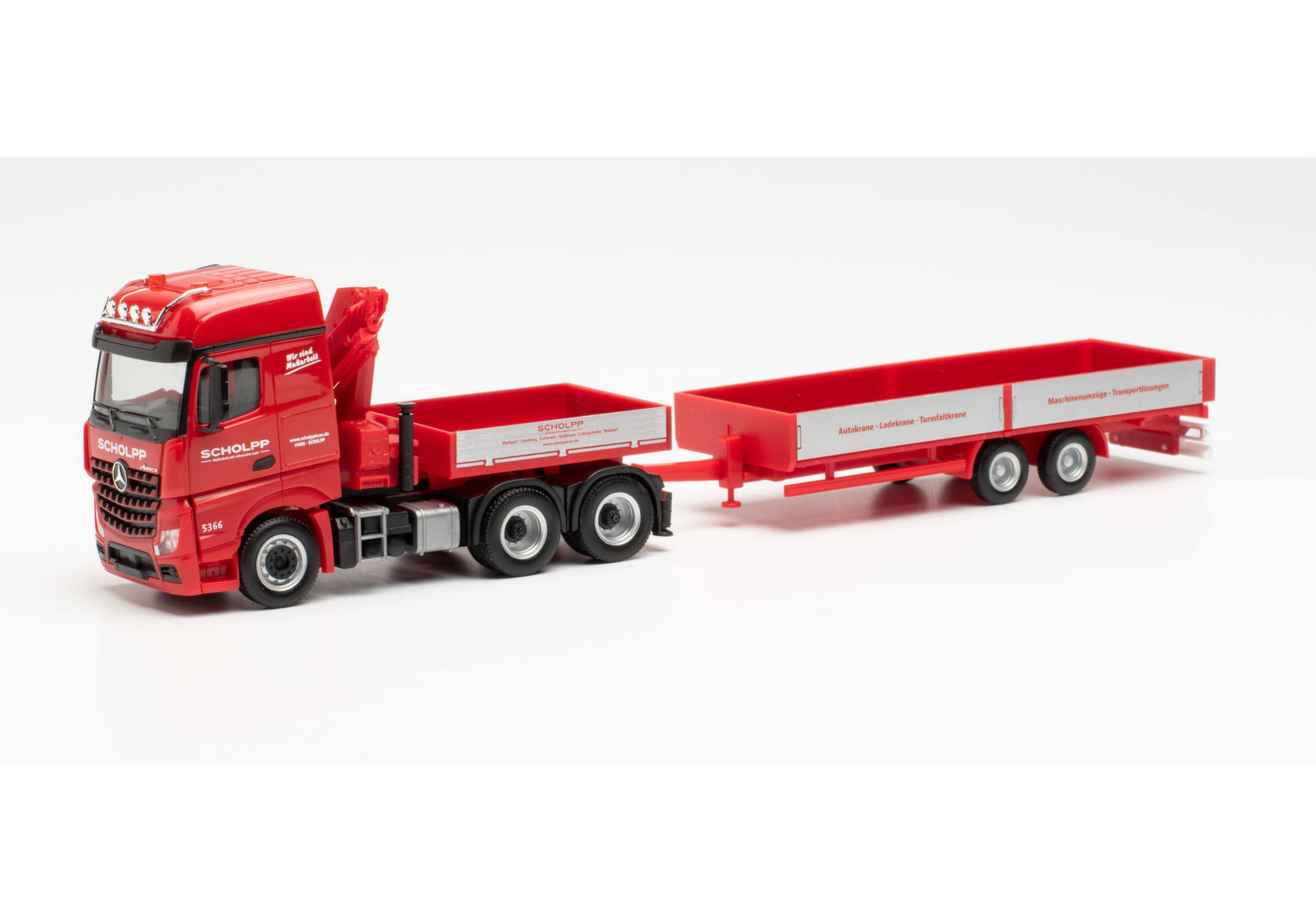 Mercedes-Benz Arocs tractor with loading crane, ballast flatbed, and low-body trailer Scholpp.