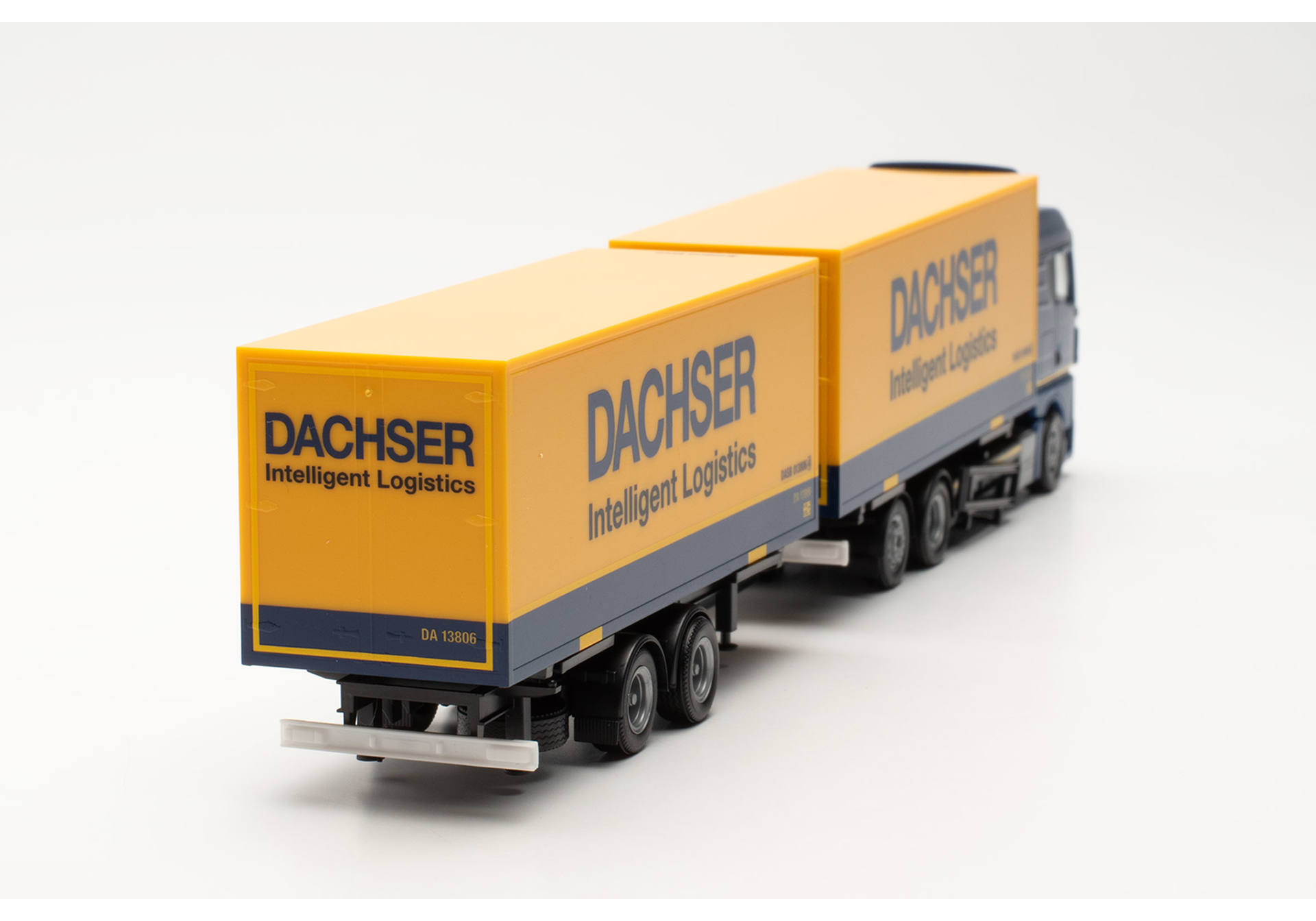 MAN TGX GM interchangeable tandem box trailer "Dachser"