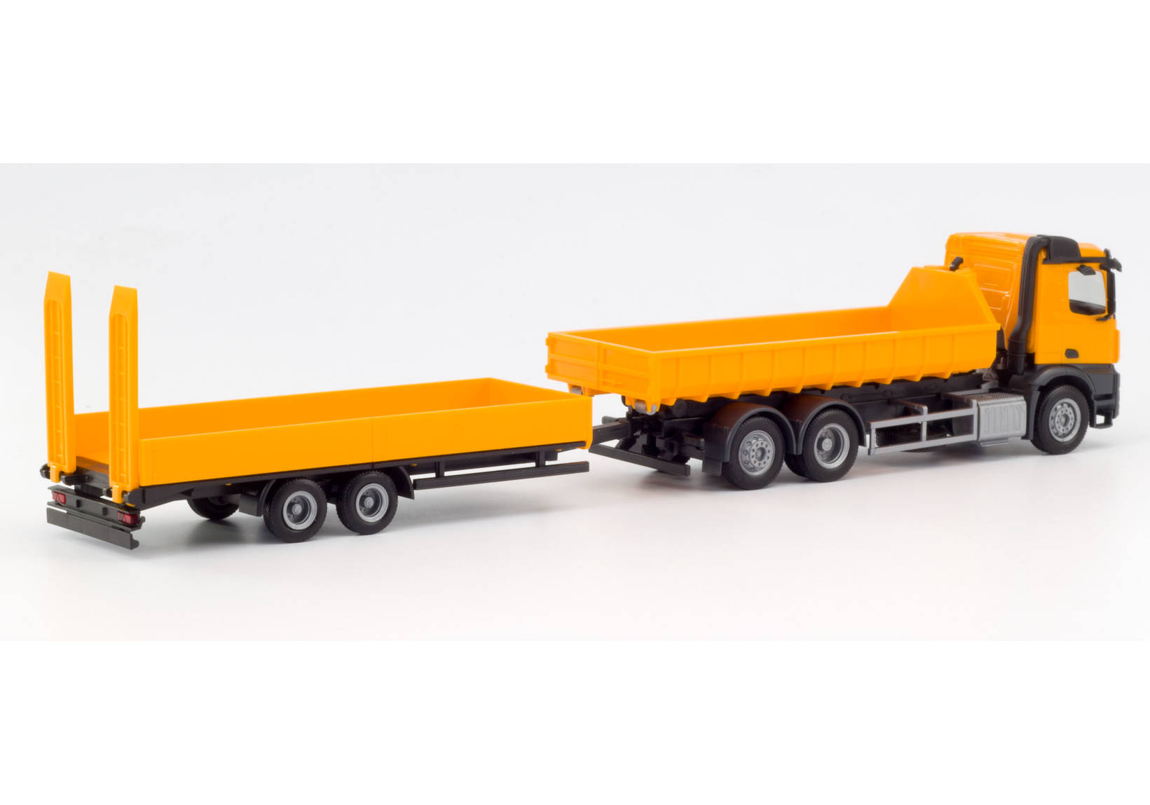 Mercedes-Benz Arocs M roll off truck with deep loading trailer with ramps