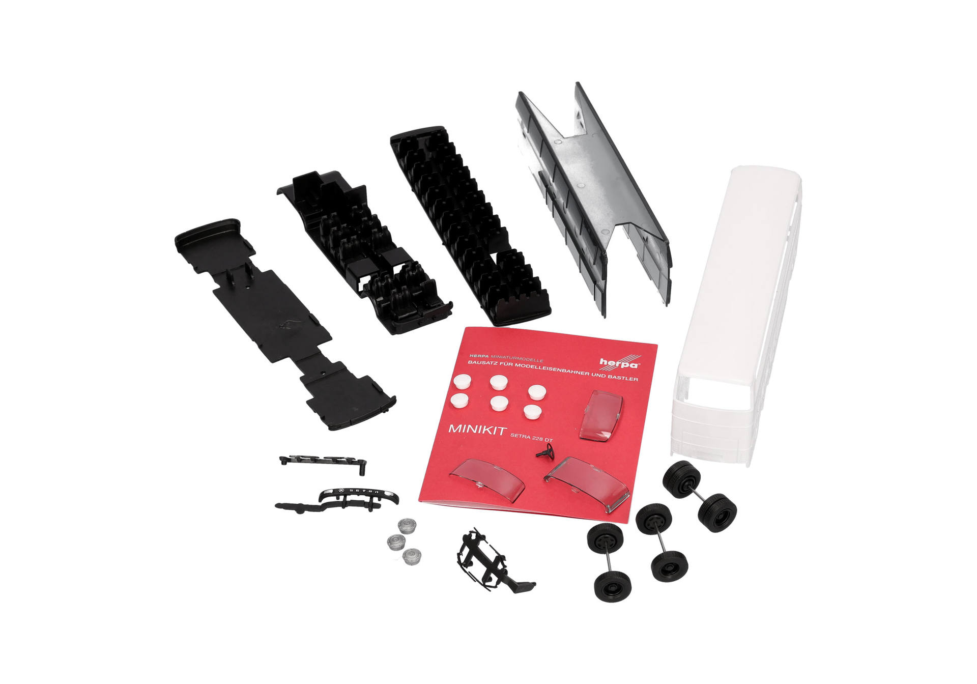 model train, railway accessories, scenery parts, black components, instruction booklet