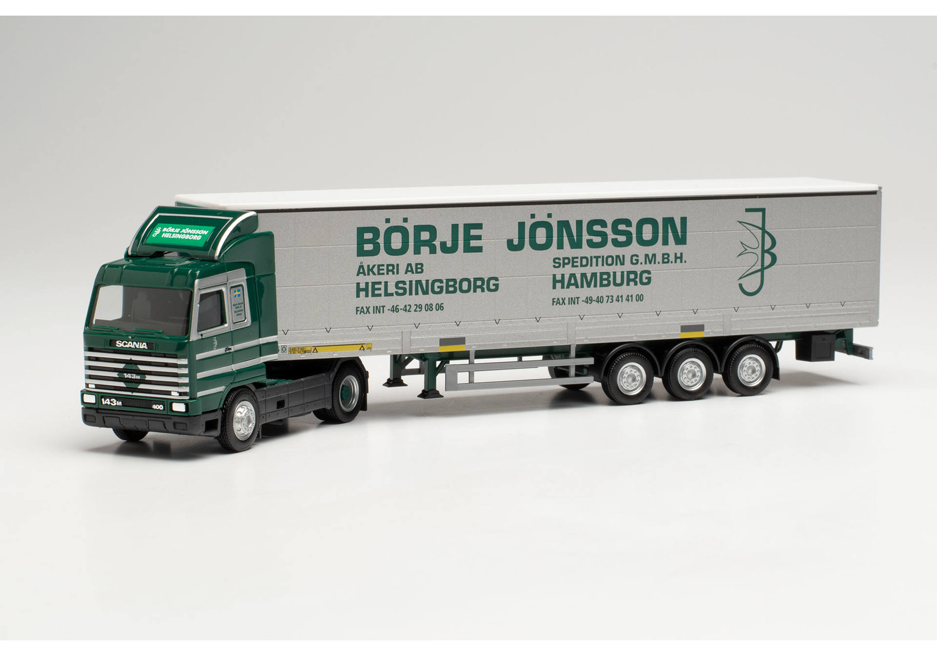 Scania 143 SL Gardinenplanen-Sattelzug mit Bordwänden „Börje Jönsson“