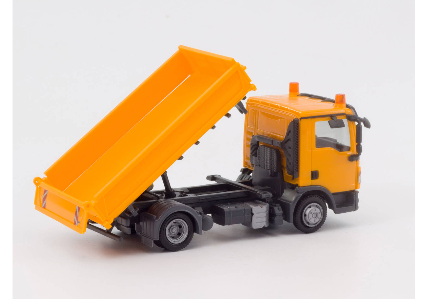 MAN TGL three way tipper, orange