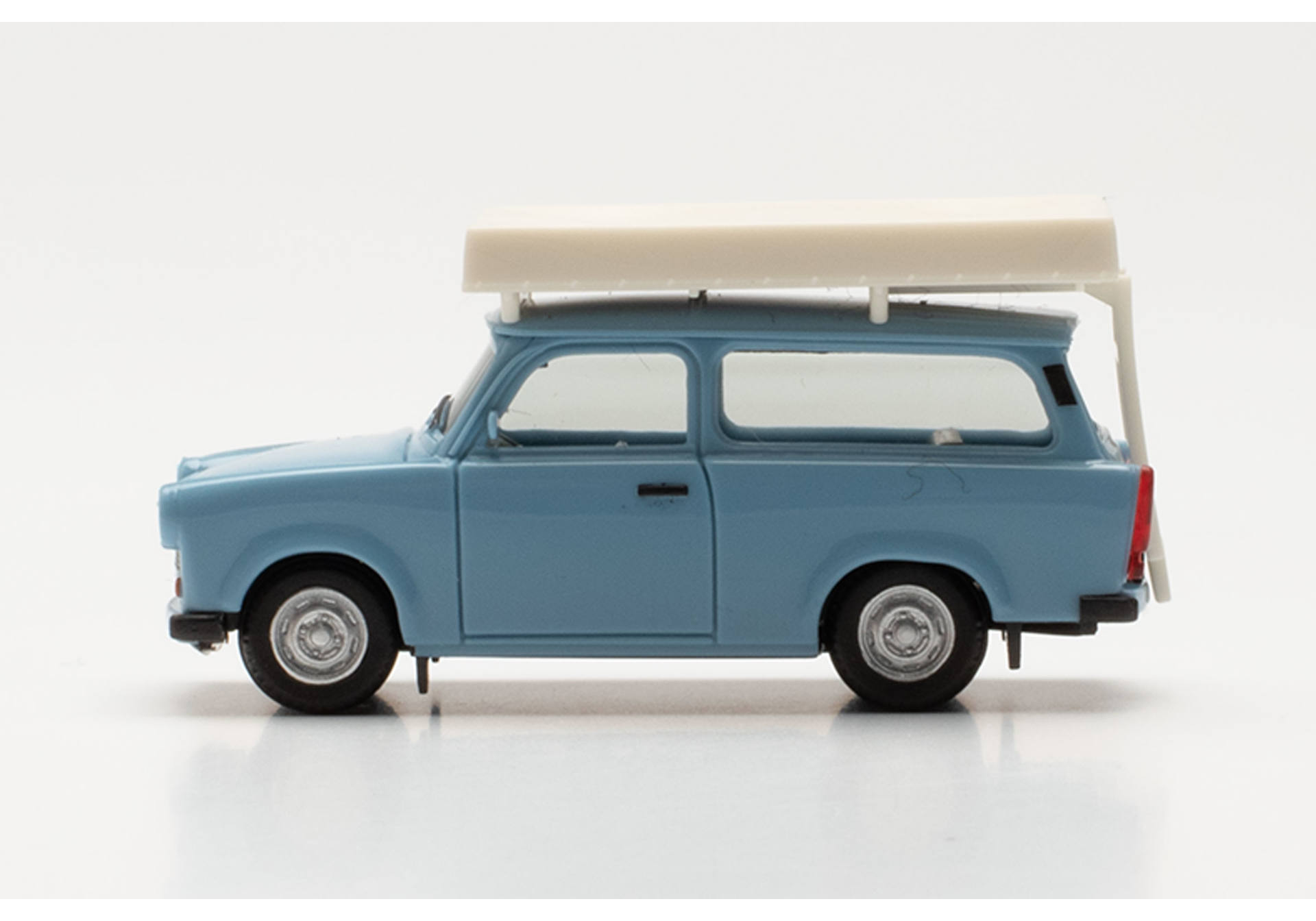 Trabant Universal with roof top tent (during driving operation), pastelblue