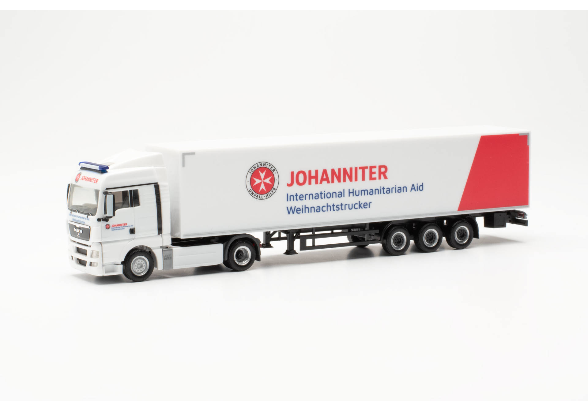MAN TGX XLX box semitrailer "Johanniter Weihnachtstruck 2023"