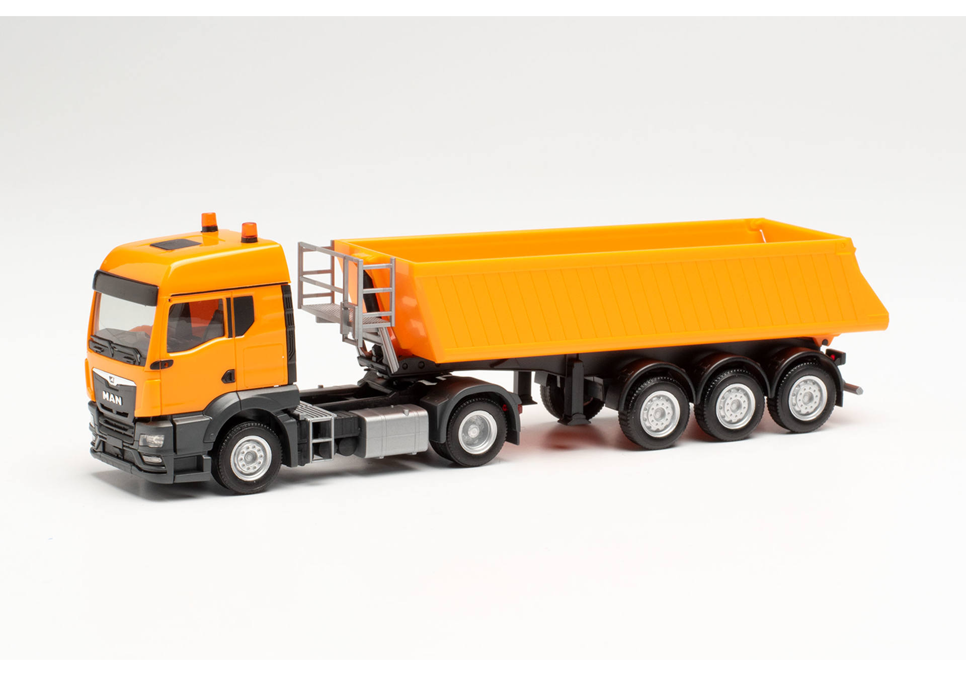 MAN TGS TM Schmitz dump semitrailer, municipal orange