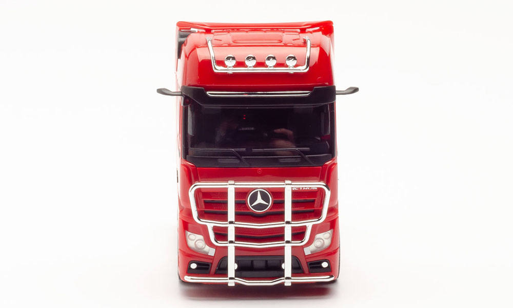 rigid tractor with impact protection and lamp bracket