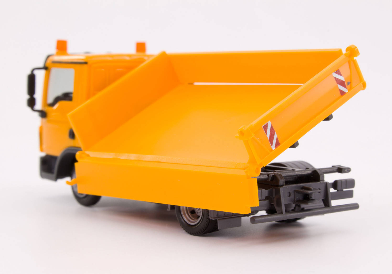 MAN TGL three way tipper, orange