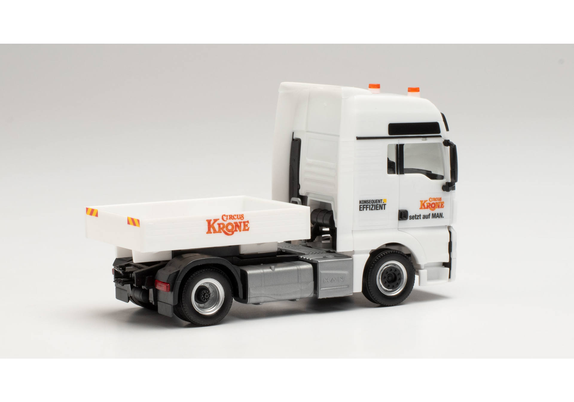 MAN TGX XXL Euro 6c tractor with ballast flatbed Circus Krone