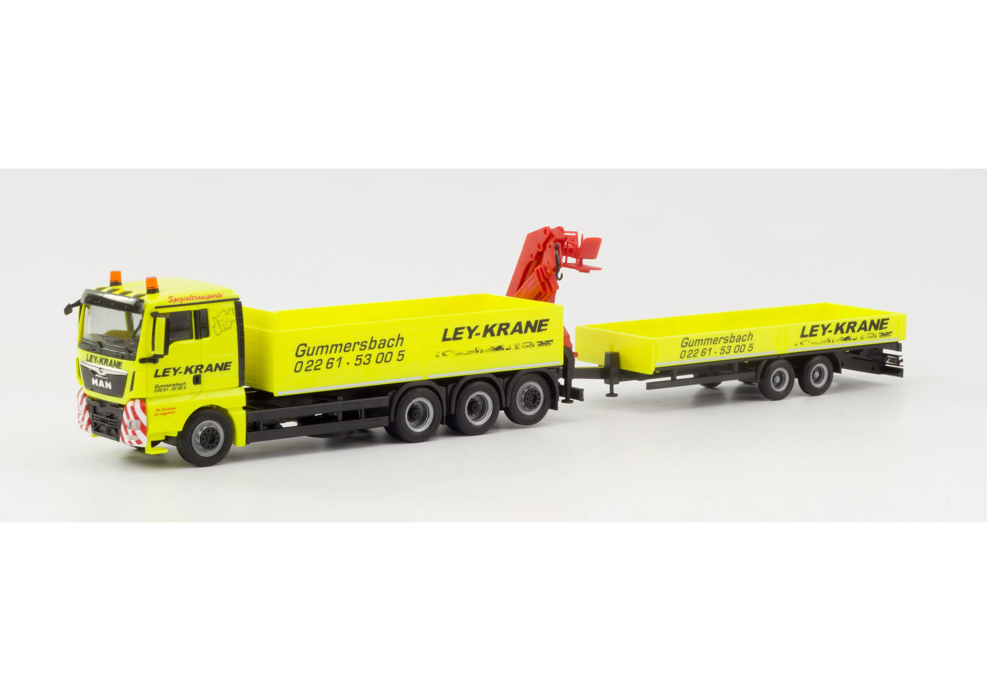 MAN TGX XL Euro 6c platform truck with crane and deep loading trailer "Ley Krane Gummersbach" (Nordrhein-Westfalen / Gummersbach)