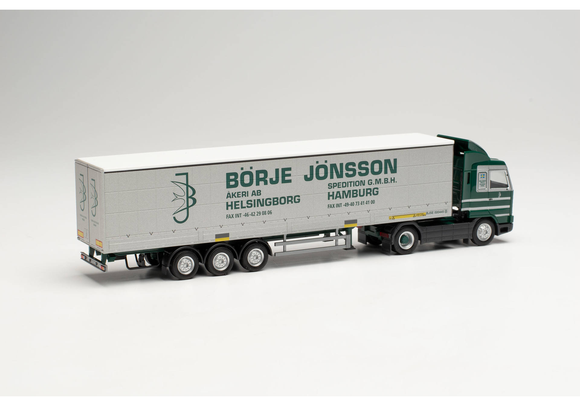 Scania 143 SL Gardinenplanen-Sattelzug mit Bordwänden „Börje Jönsson“