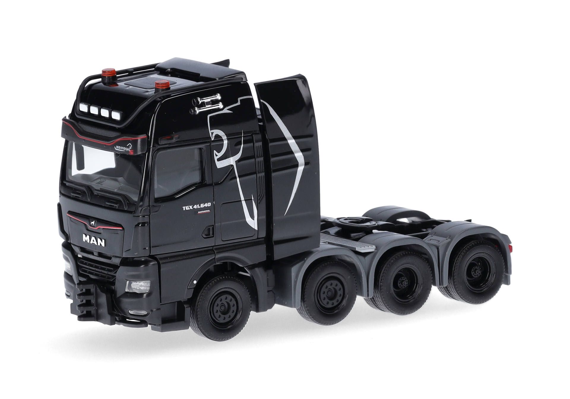 MAN TGX GX heavy-duty rigid tractor 4axles, black "MAN Truck & bus SE"