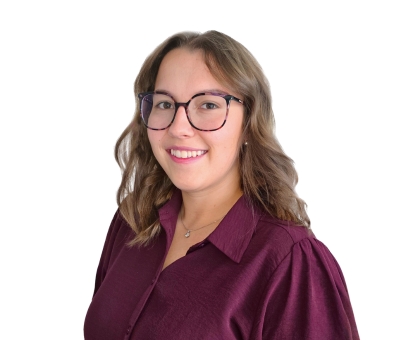 Smiling young lady with dark blonde hair, glasses and burgundy blouse