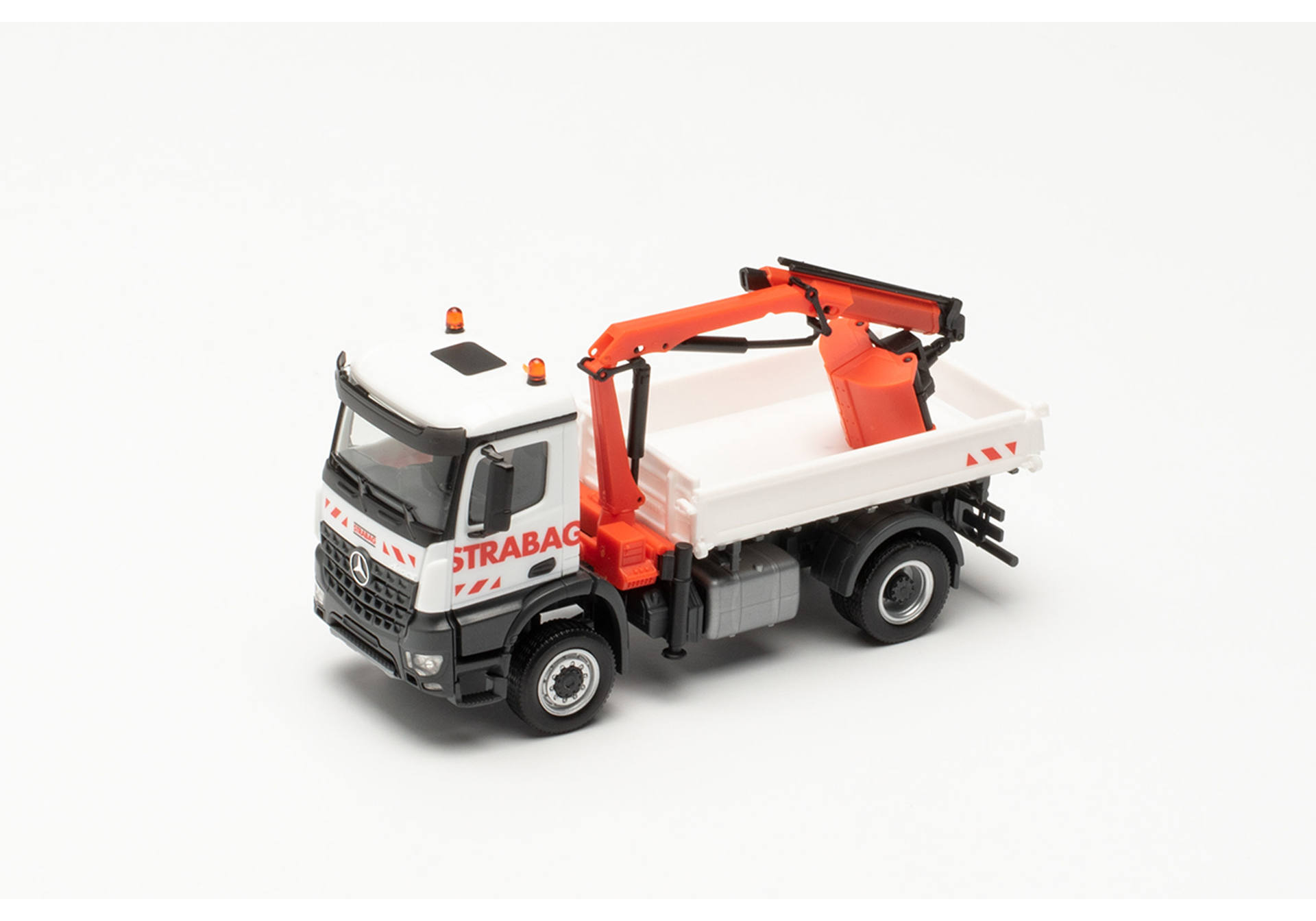 Mercedes-Benz Arocs S three-way tipper with crane STRABAG