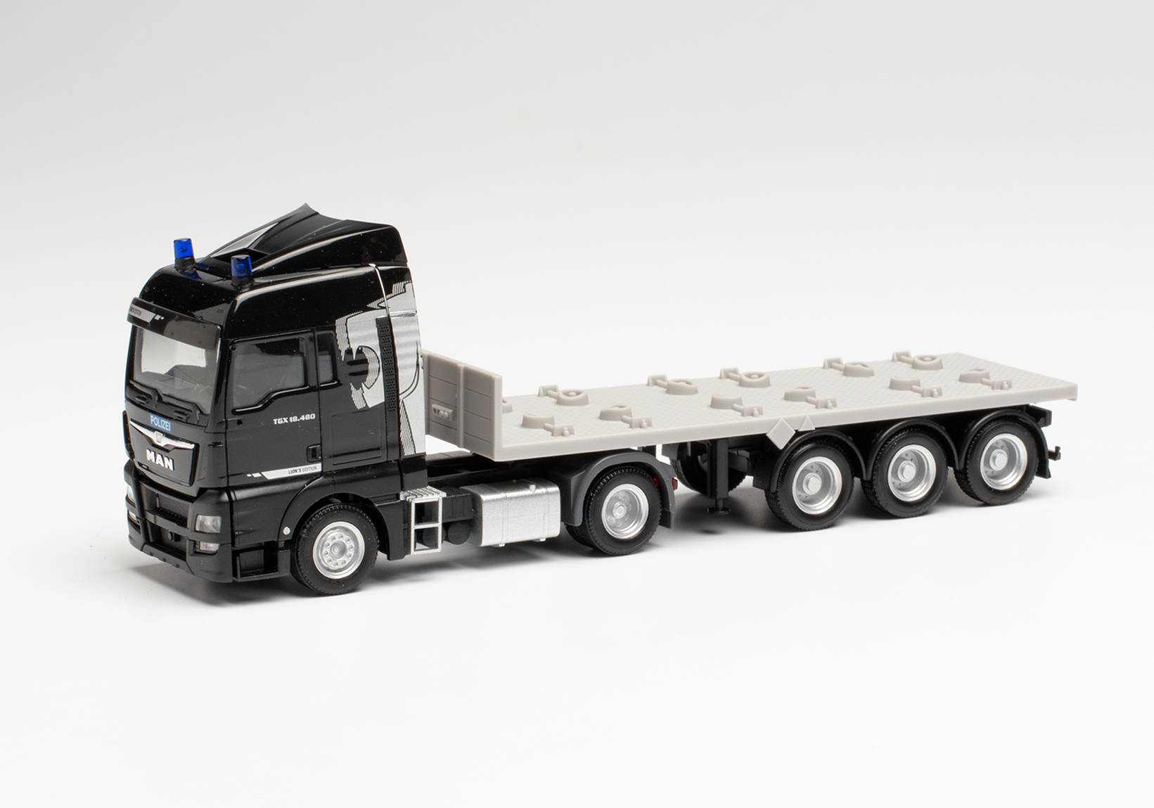 MAN TGX XLX E6 flatbed semitrailer truck "Polizei"