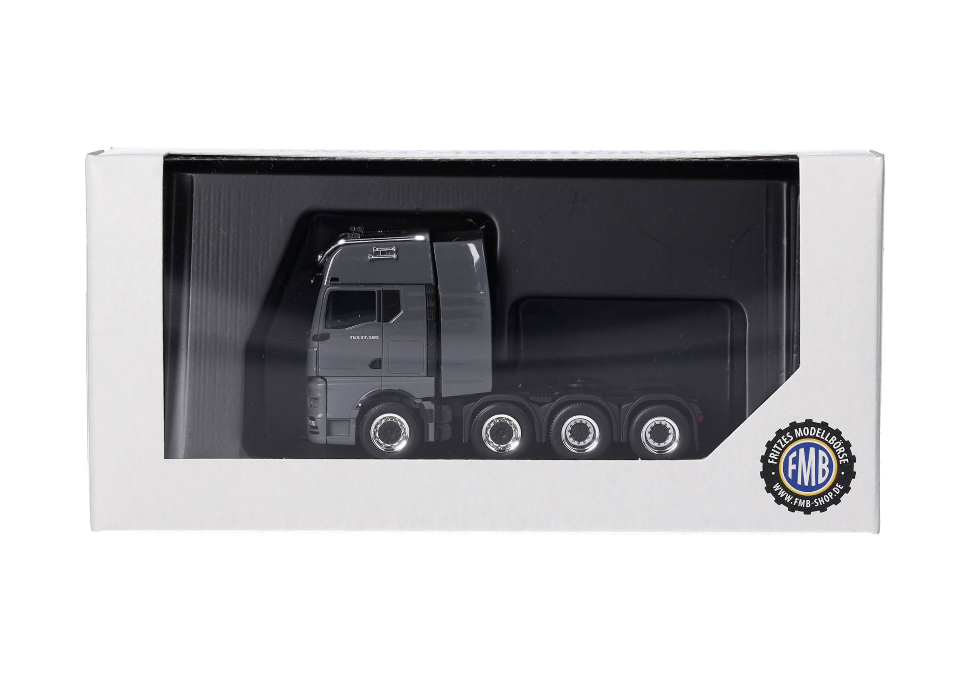 MAN TGX GX heavy-duty rigid tractor 4axles, grey